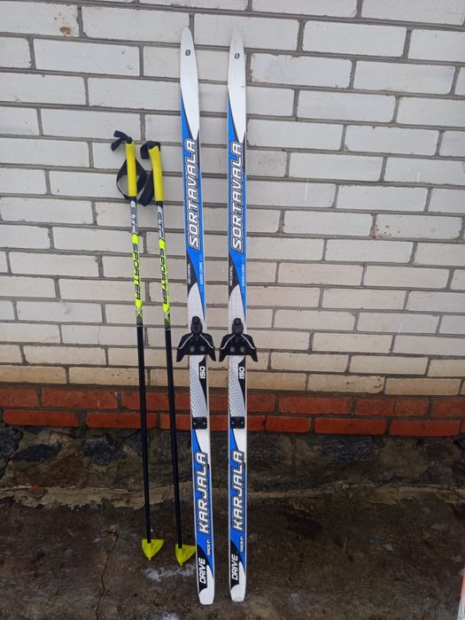 Лижі, палки, взуття