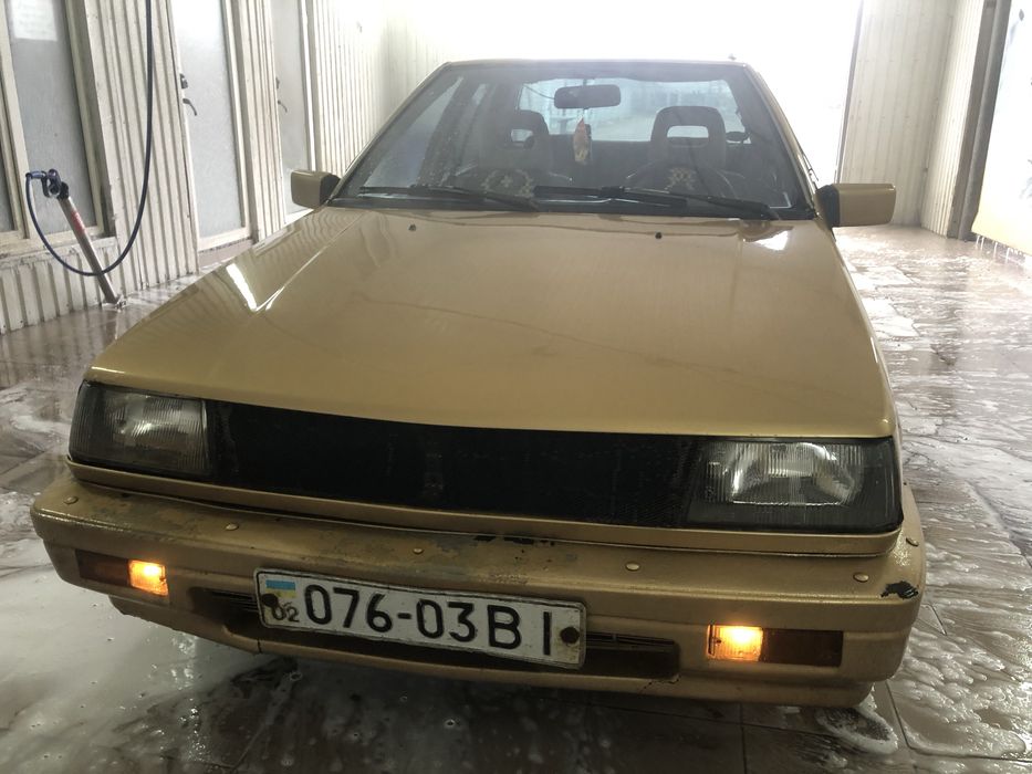 Міцубіші лансер.