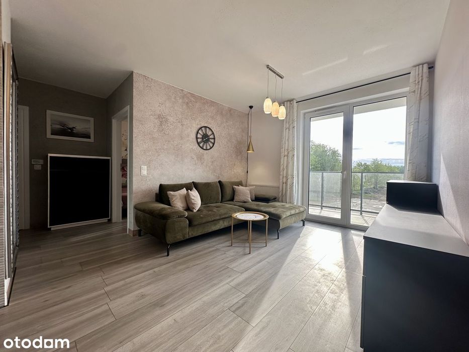 Apartament z miejscem parkingowy oraz pomieszczeniem gospodarczym