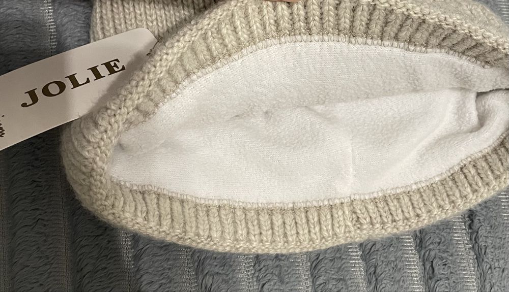 Нова жіноча шапка