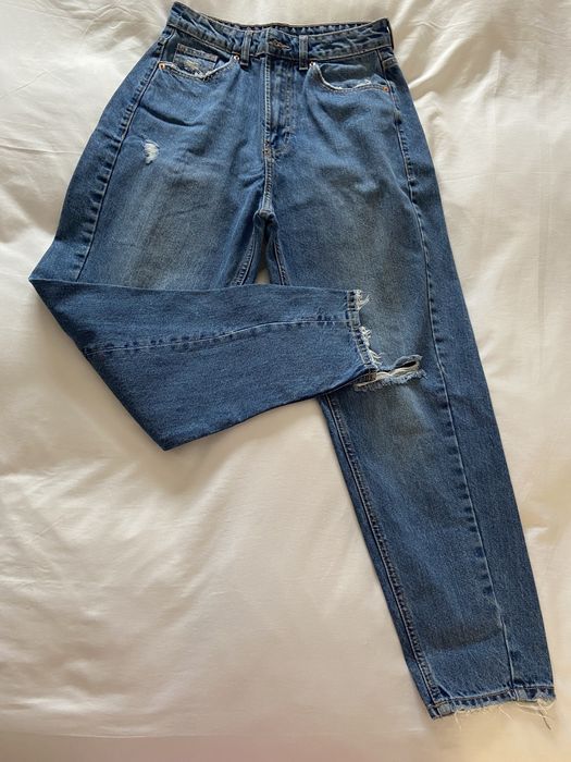 Calças de ganga rasgadas