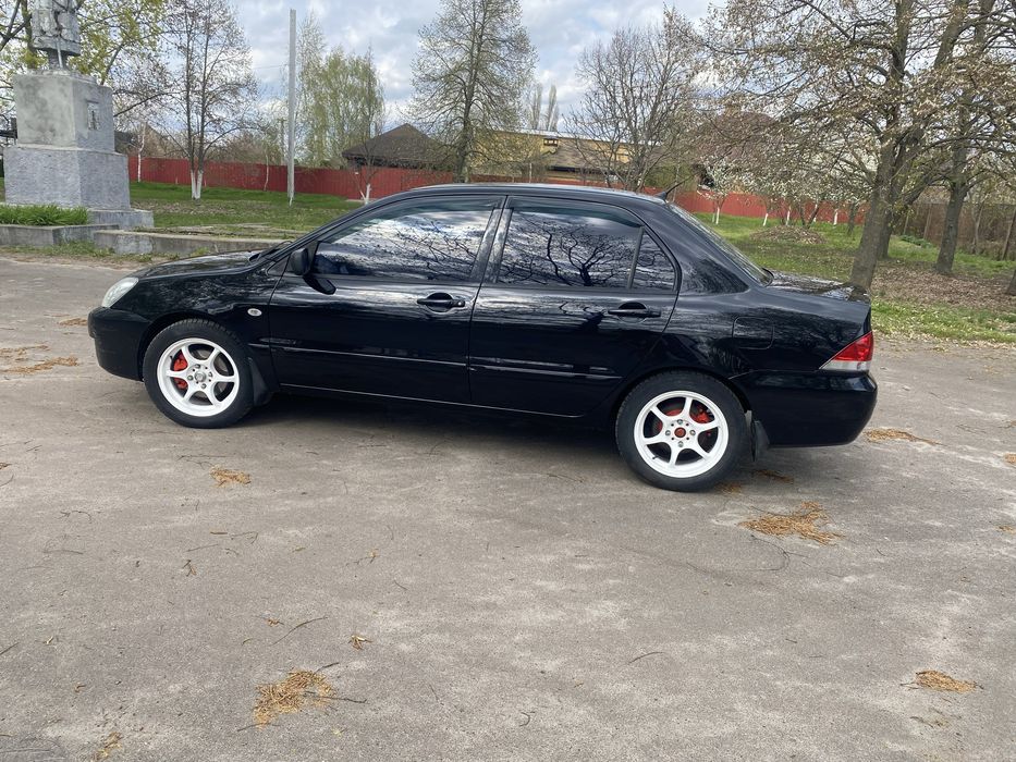 Mitsubishi Lanser 1,6 gaz