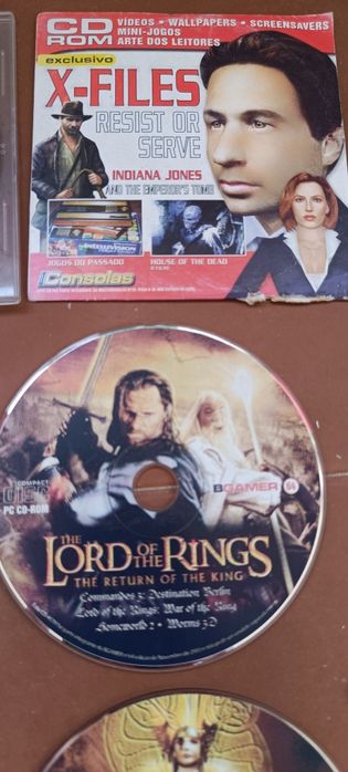 11 CDs / DVD jogos usados