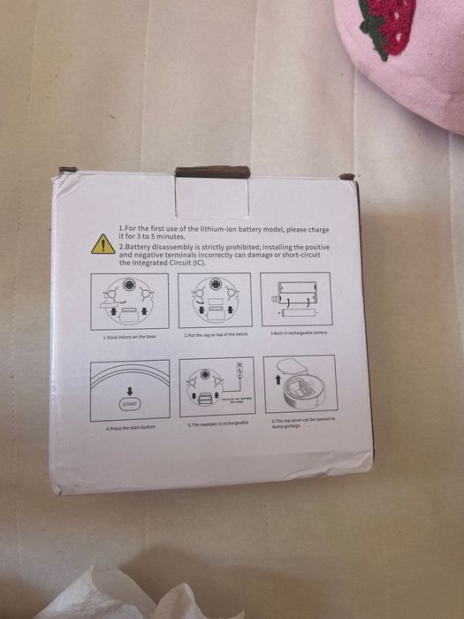 Mini robo aspirador