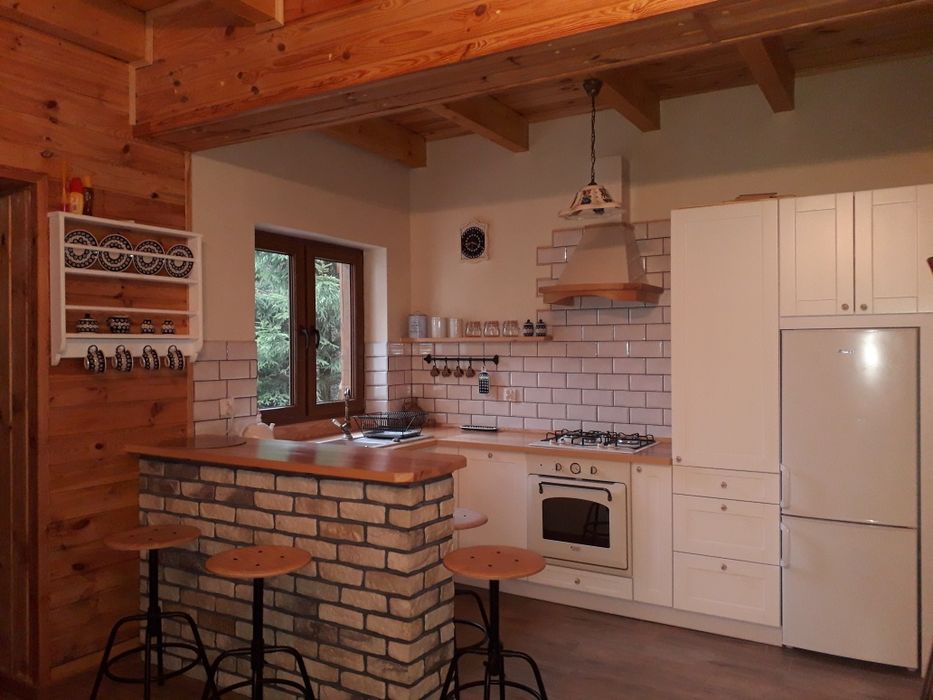 Dom nad jeziorem kiełpińskim LAS balia łódka