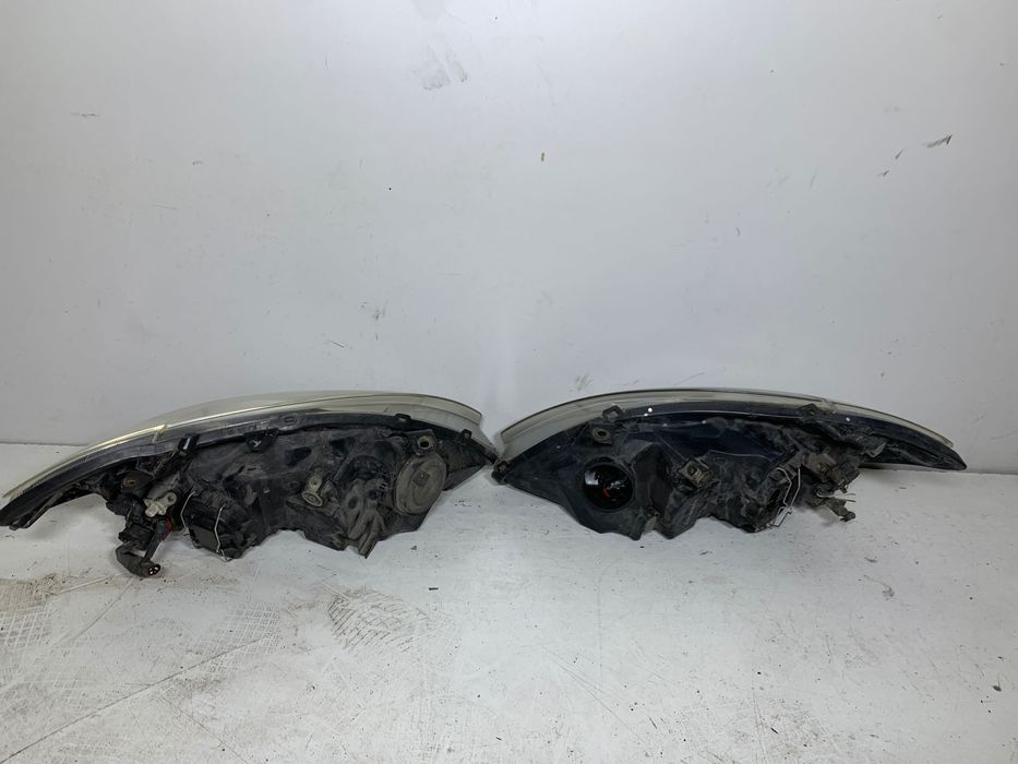 Prawy Lewy reflektor lampa EUROPA lampy przód toyota corolla E12 2006r