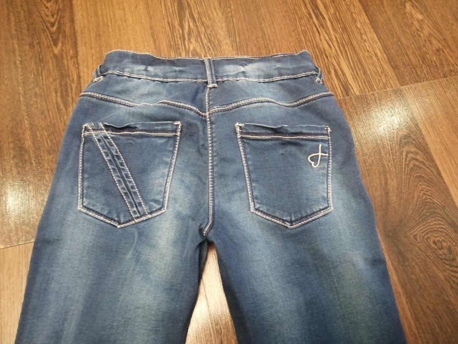 Spodnie Kanz 134 jeansy