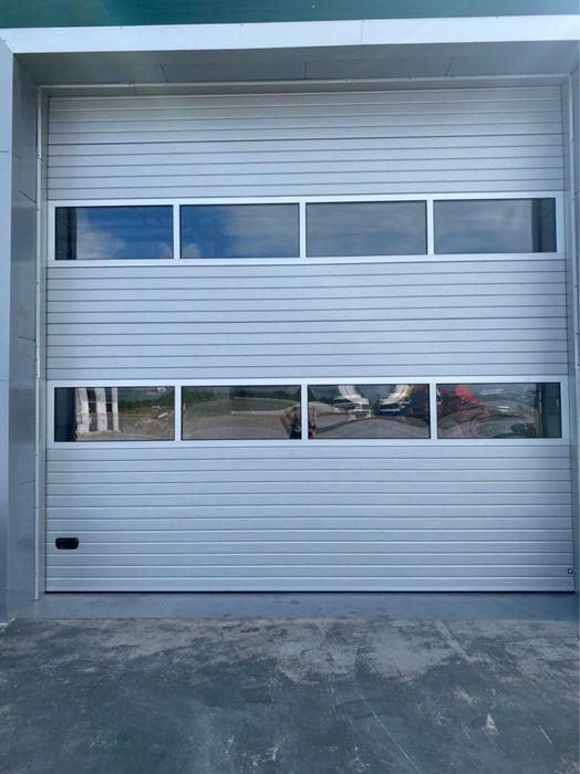 Секційні гаражні та промислові ворота / автоматика