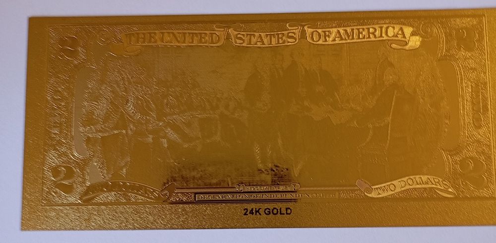 Coleção de notas de dólares revistidas a ouro