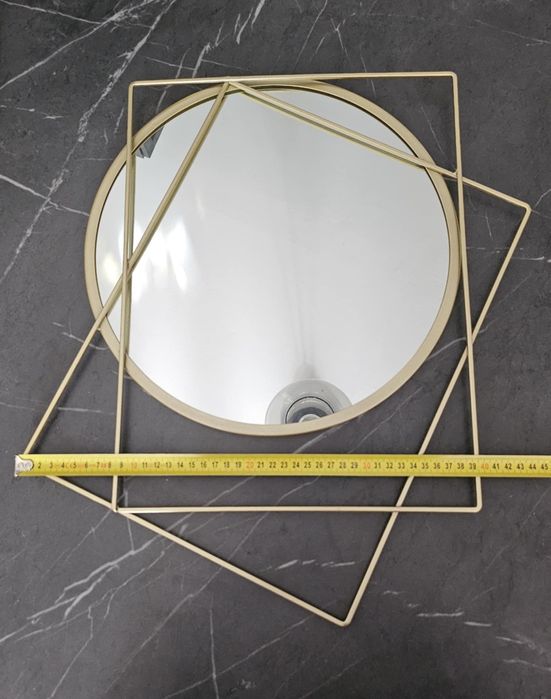 Designerskie lustro naścienne