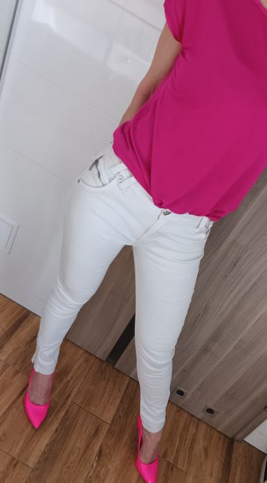 Białe jeansy z zamkami przy nogawkach L