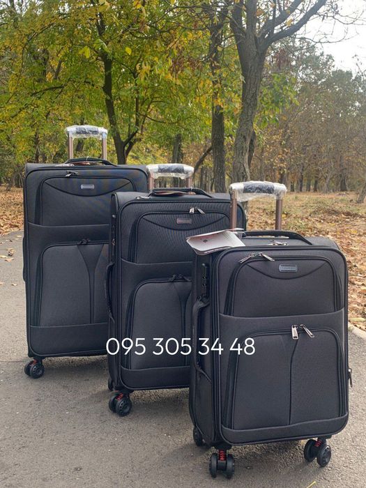Чемодан Tourist  S ,M, L.  все размеры на амортизаторах , хамелеон