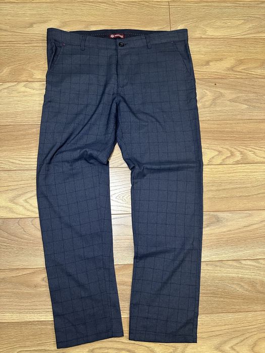 Брюки класичні в клітинку синього коліру
