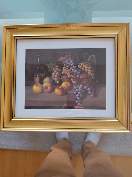 Quadro com moldura em dourado