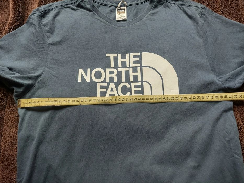 футболка фірми The North Face оригінал 

Размер:  L

Заміри детальні: