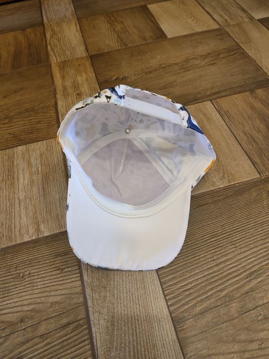 Nowa czapka z daszkiem dla dziecka Dinozaury