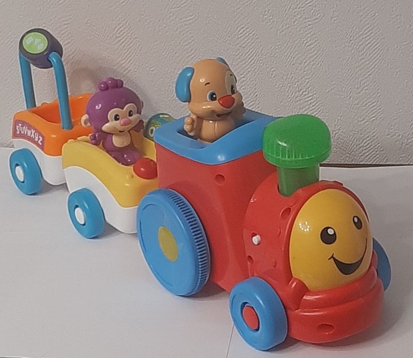 Развивающая игрушка "Поезд умного щенка" от бренда  Fisher Price