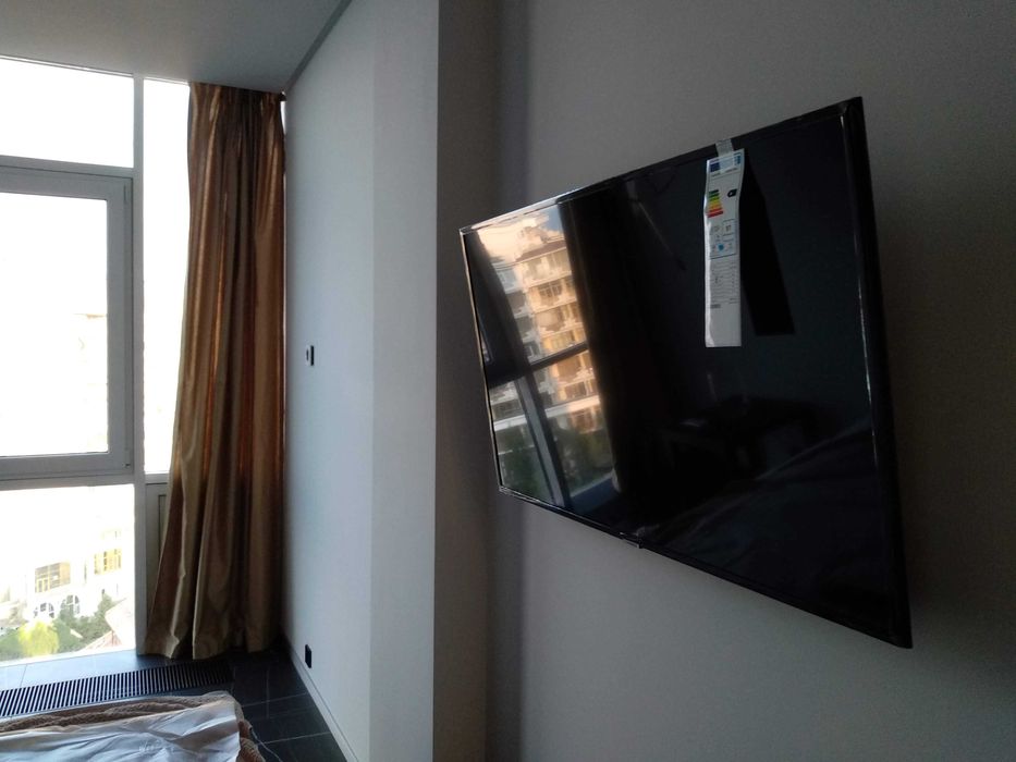 Повесить телевизор, закрепить, смонтировать на кранштейн