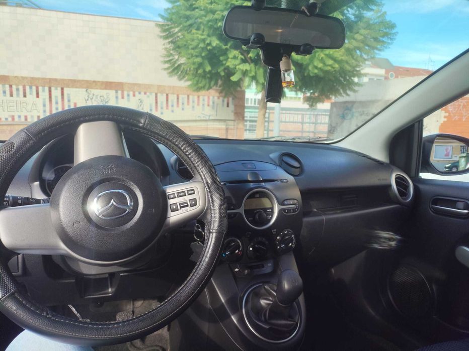 Mazda 2 1.3 gasolina +-211 mil KMS com AC 2010