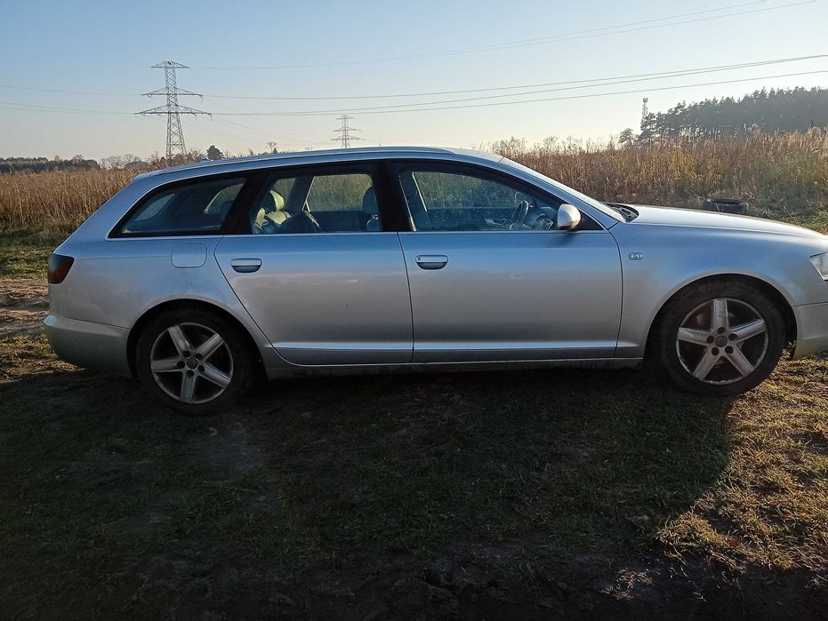 Audi A6 C6 zderak przod srebrny LY7W kpl