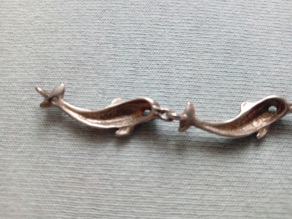 Srebrna bransoletka delfiny