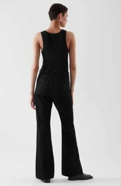 cos розкльошені джинси