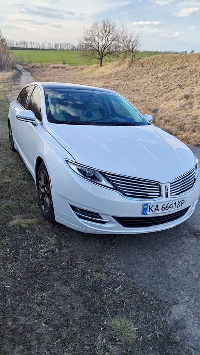 Гібрид бізнес класу. Розхід 5,5 по місту