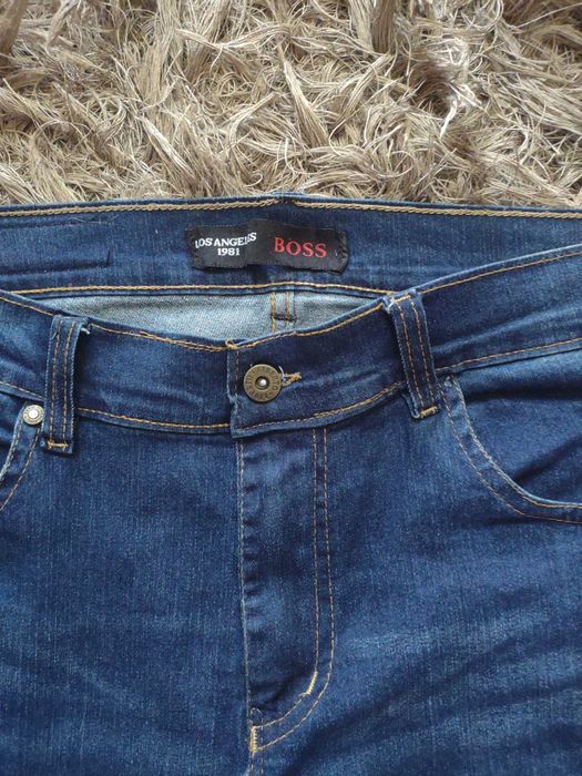 Mega okazja !  Spodnie  jeansy   Boss  Jeans    31