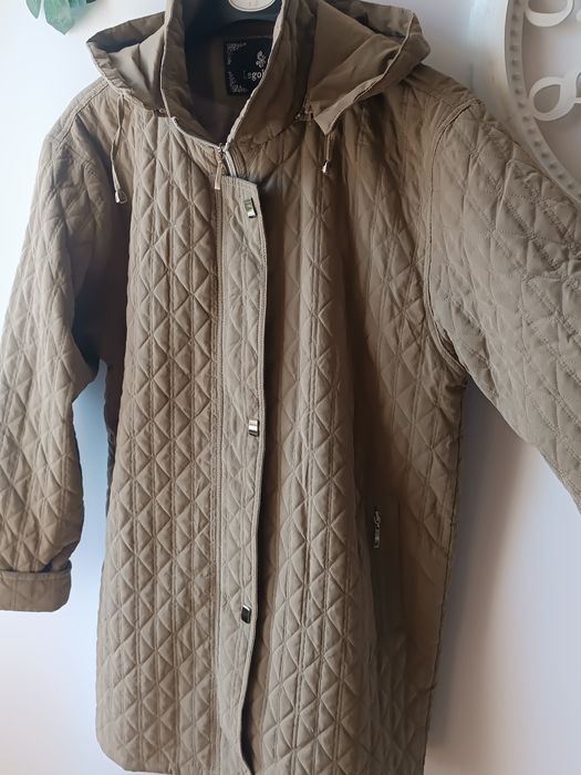 Стьобана куртка з капюшоном р 54 . Нова!