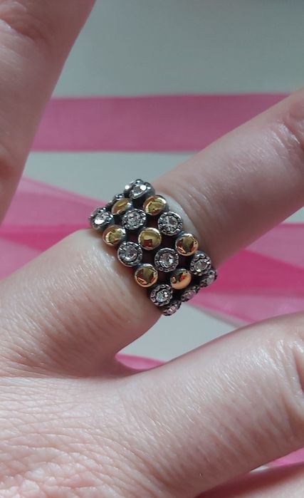 Anel bicolor, em aço, com zirconias. T17