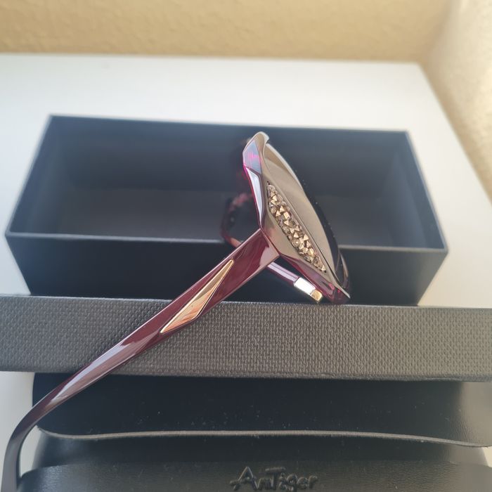 Óculos de sol de cor bordeux