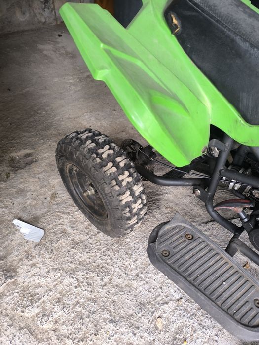 Moto 4 criança a gasolina