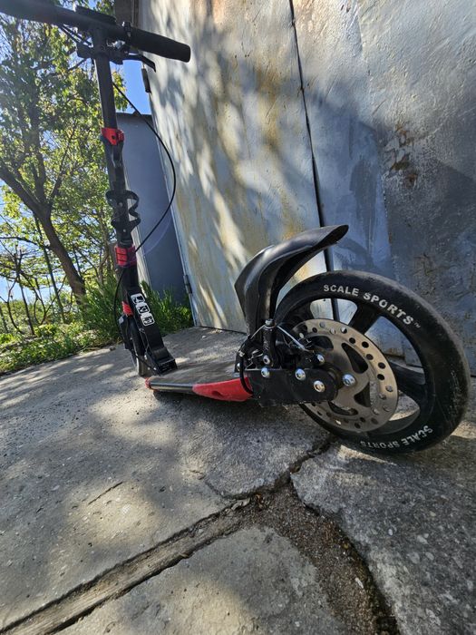 самокат с амортизацией