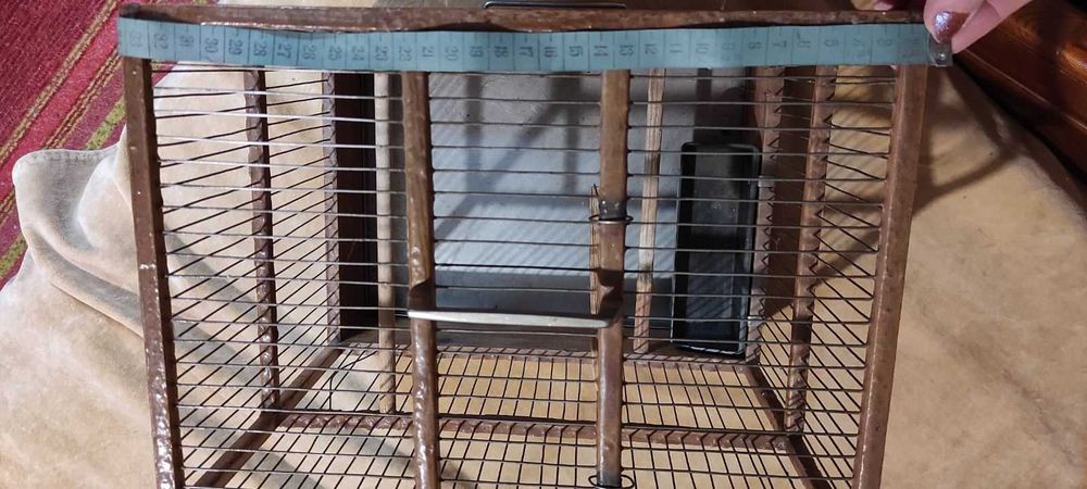 Клітка для папуги