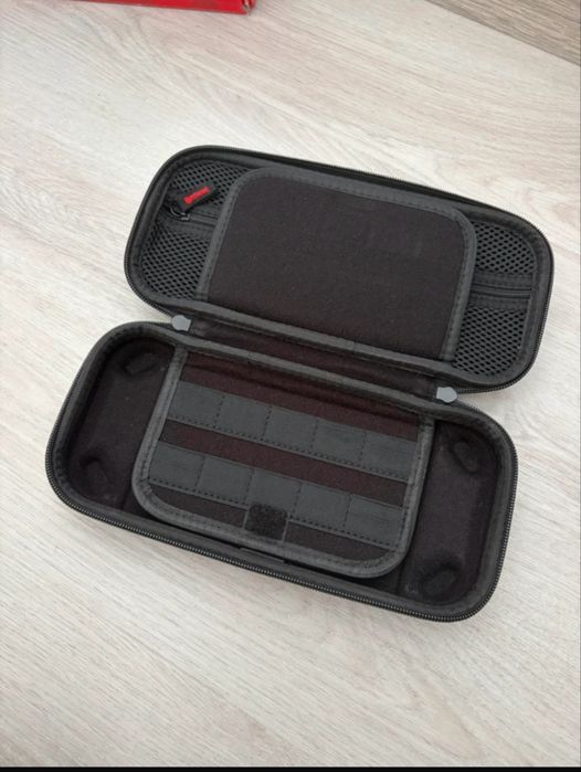 Nintendo Switch  + 2 jogos + bolsa transporte + Comando karts