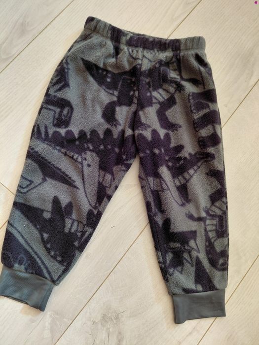 Spodnie polarowe 92 H&M dinozaury
