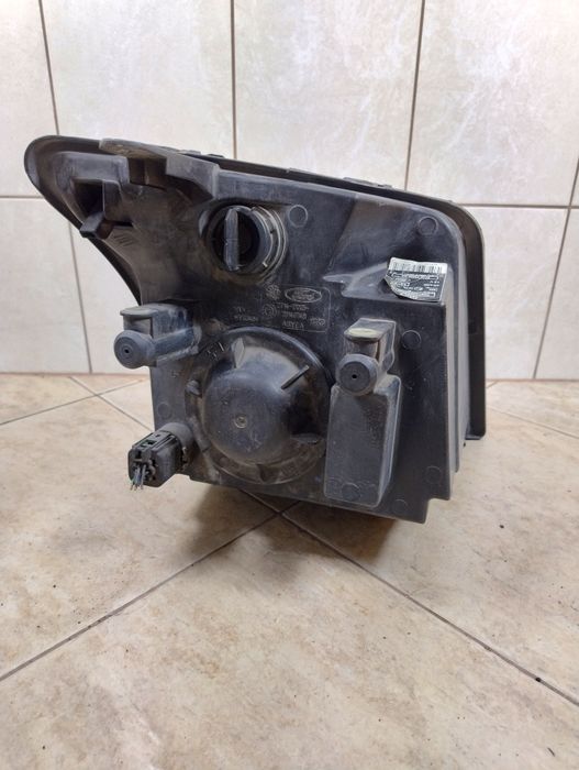 Ford connect tourneo lampa reflektor lewy przód Europa oryginał wysyłka Ford Transit Connect I (2002-2013)