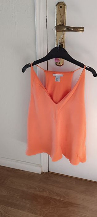 Orange top from H&M. Size S