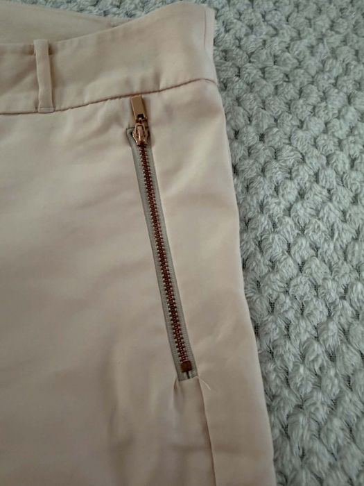 Eleganckie spodnie Reserved rozmiar 42/44.