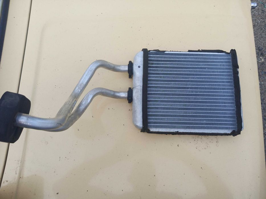 Радиатор печки Опель Астра