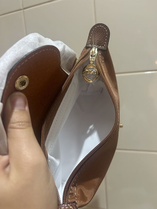 Mala longchamp castanha