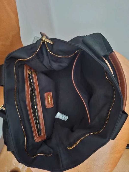 Mala preta e castanha da Tintoretto