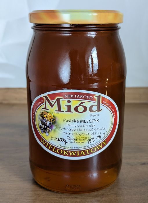 Miód wielokwiatowy świeży  lub pyłek kwiatowy.