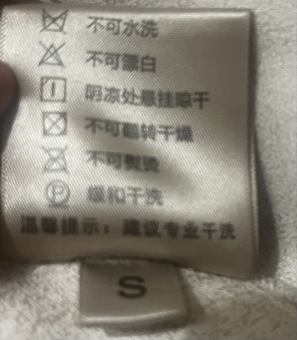 Білий полушубок з вовни