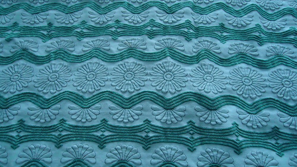 Colcha verde acetinada