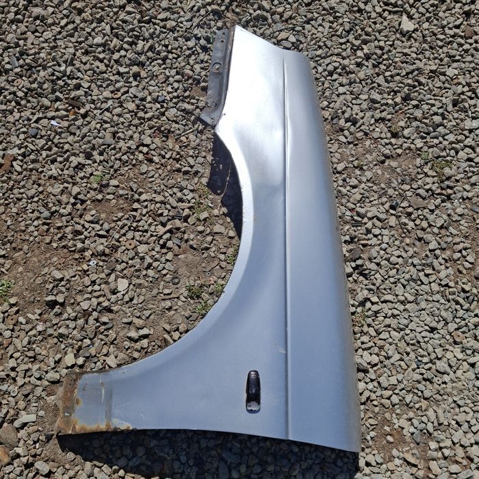 Левое переднее крыло лада приора.