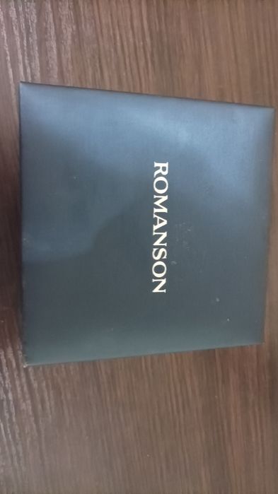 Годинник,Romanson