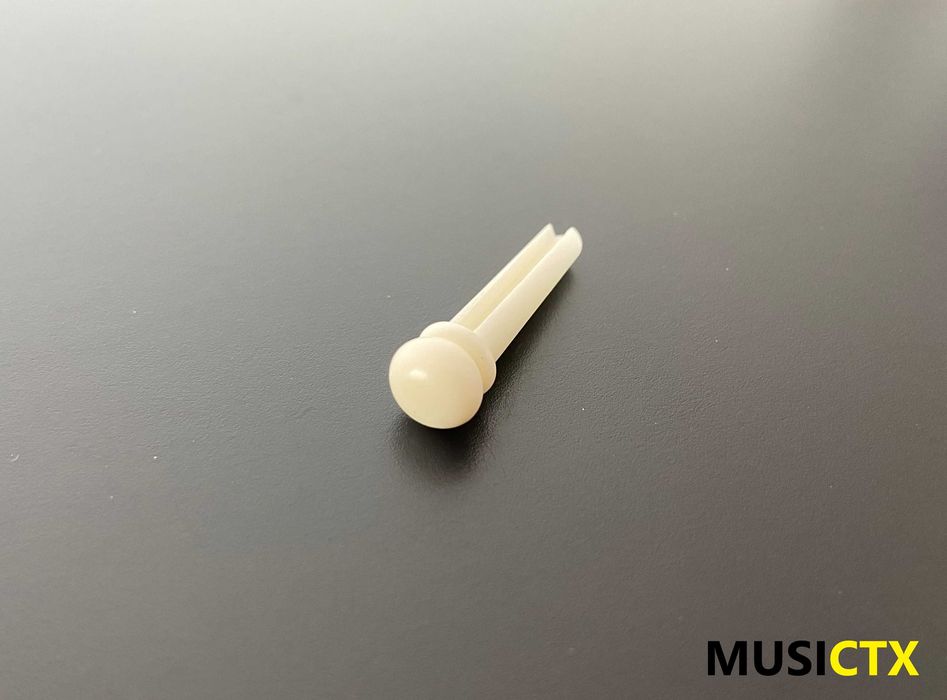 Pins em osso para guitarra folk