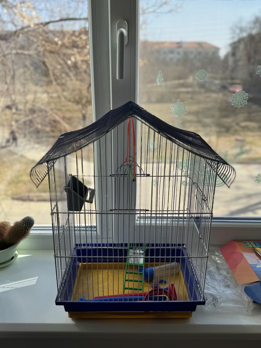 Клітка для папуги