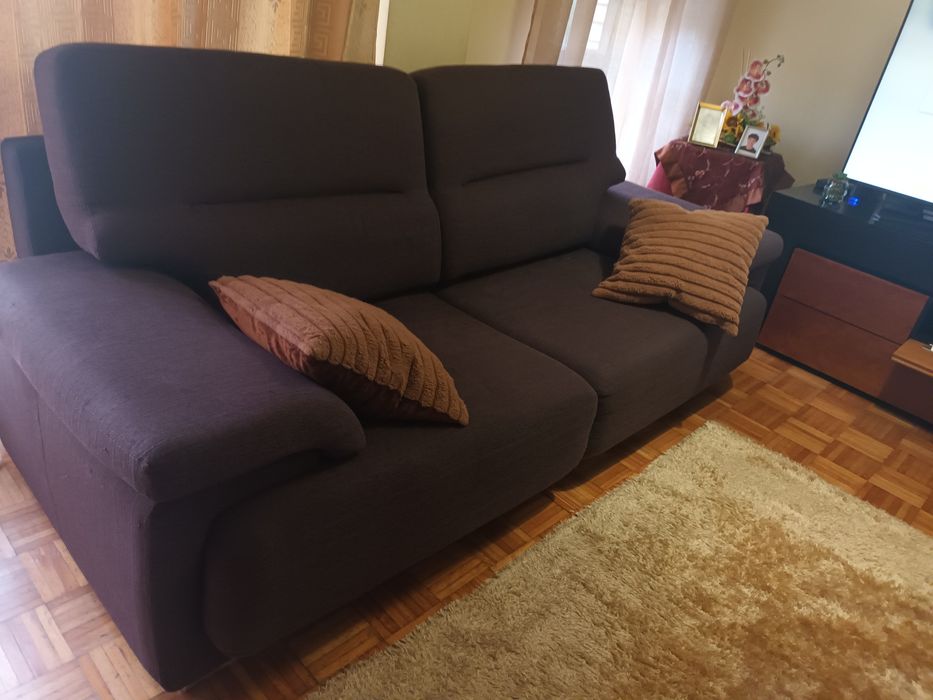 Sofá cama de três lugares